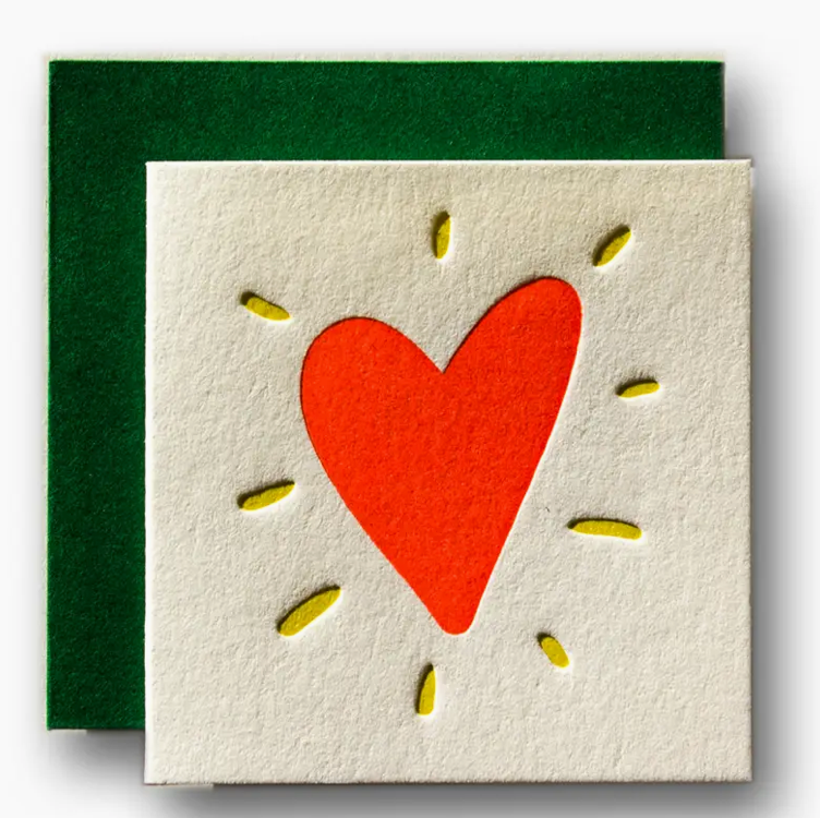 Card with a red heart design on a white background